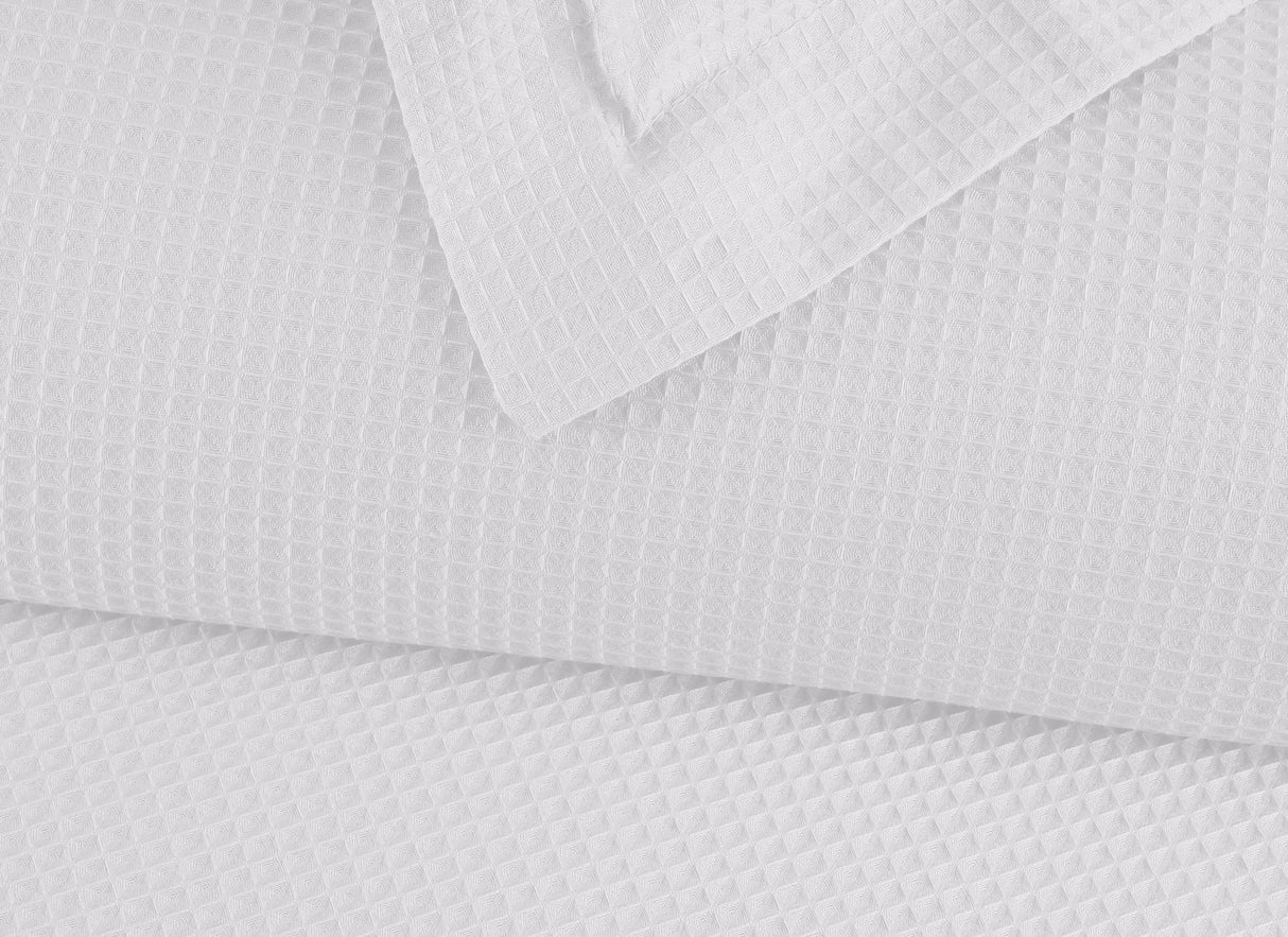 Duvet Elric · confeccionado en 100% algodón • tejido waffle que ofrece una textura única.