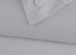 Duvet Elric · confeccionado en 100% algodón • tejido waffle que ofrece una textura única.